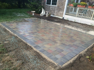 stone patio, installed by Dependable Landscaping